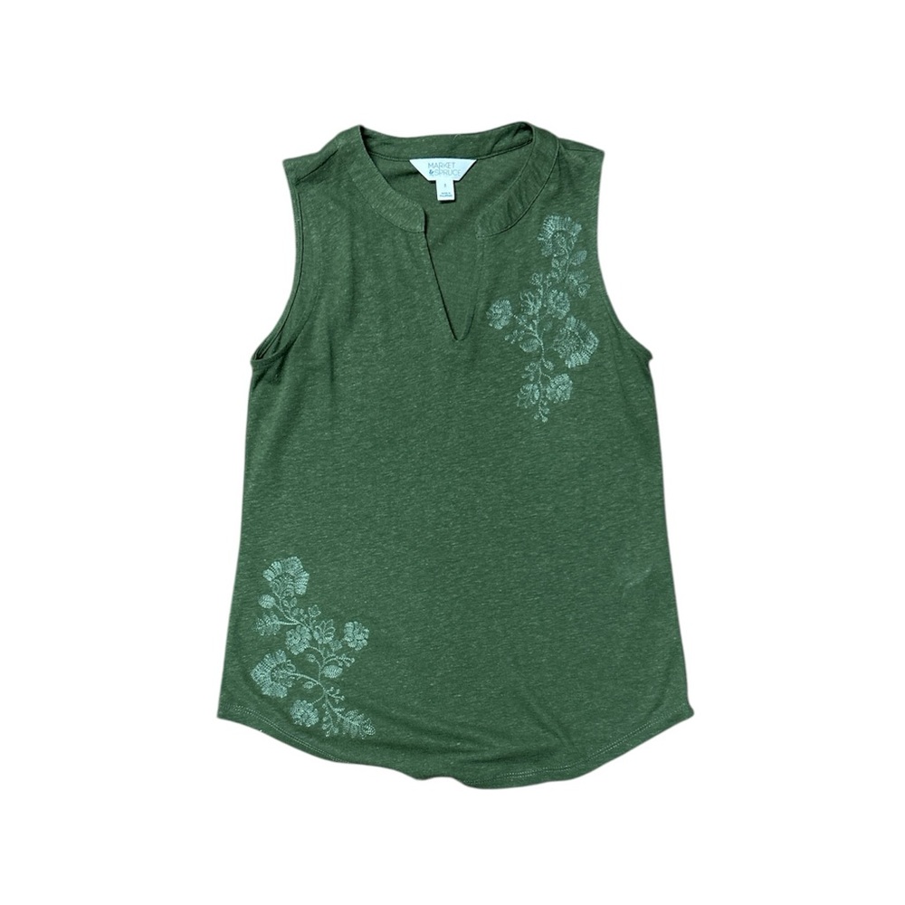 Sleeveless green top with floral detail